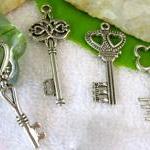 Four Silver Key Charms